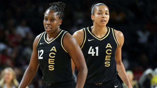LAS VEGAS, NEVADA - JUNE 11: Chelsea Gray #12 and Kiah Stokes #41 of the Las Vegas Aces walk on the court during a break in the fourth quarter of their game against the Chicago Sky at Michelob ULTRA Arena on June 11, 2023 in Las Vegas, Nevada. The Aces defeated the Sky 93-80.
