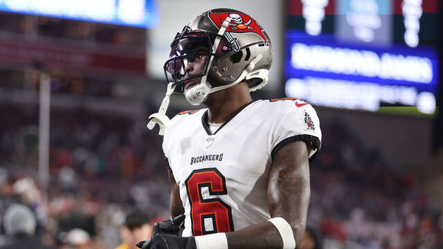 TAMPA, FLORIDA - JANUARY 16: Julio Jones #6 of the Tampa Bay Buccaneers stands on the sideline against the Dallas Cowboys during the NFC Wild Card Playoff game at Raymond James Stadium on January 16, 2023 in Tampa, Florida. (Perry Knotts/Getty Images)