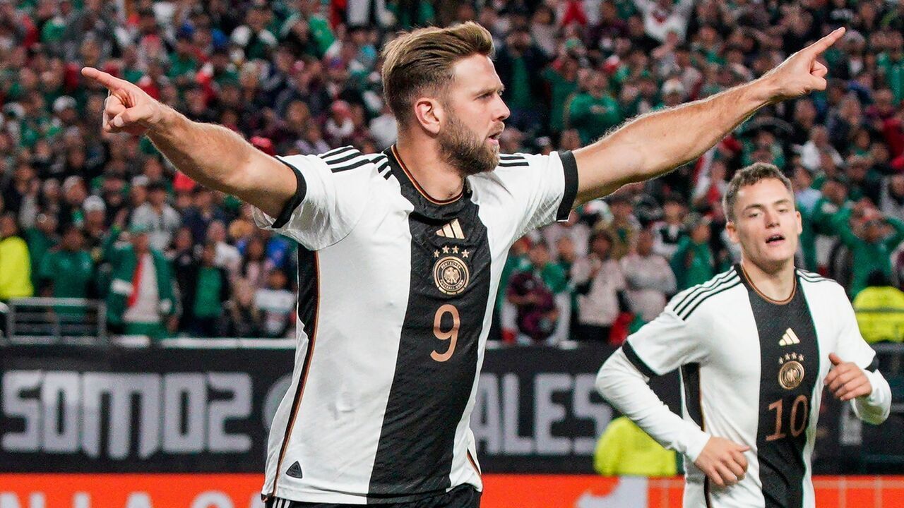 TOPSHOT - Germany's forward #09 Niclas Fullkrug (L) celebrates scoring his team's second goal during the international friendly football match between Germany and Mexico at Lincoln Financial Field stadium in Philadelphia on October 17, 2023.