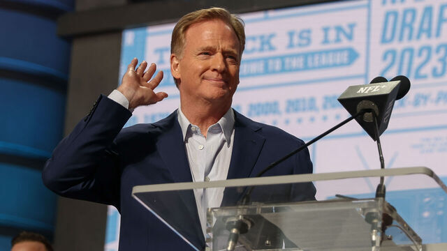 KANSAS CITY, MO - APRIL 28: Commissioner Roger Goodell holds his hand to his ear as if to tell the crowd he can't hear the boos during day two of the NFL Draft on April 28, 2023 at Union Station in Kansas City, MO.