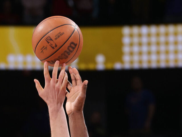 DENVER, CO - MARCH 3: Nikola Jokic #15 of the Denver Nuggets and Jaren Jackson Jr. #13 of the Memphis Grizzlies during tip-off on March 3, 2023 at the Ball Arena in Denver, Colorado. NOTE TO USER: User expressly acknowledges and agrees that, by downloading and/or using this Photograph, user is consenting to the terms and conditions of the Getty Images License Agreement. Mandatory Copyright Notice: Copyright 2023 NBAE