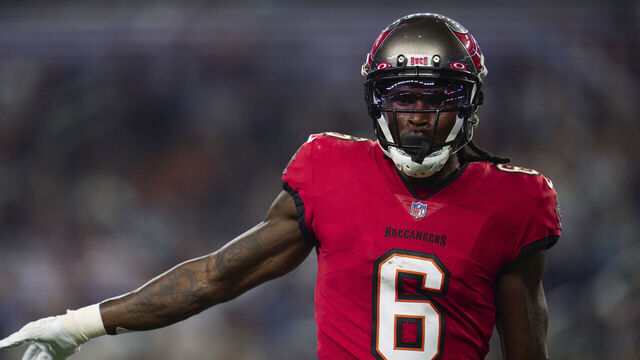 ARLINGTON, TX - SEPTEMBER 11: Julio Jones #6 of the Tampa Bay Buccaneers motions to the sideline against the Dallas Cowboys at AT&T Stadium on September 11, 2022 in Arlington, TX.
