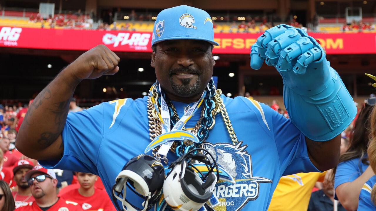 KANSAS CITY, MO - SEPTEMBER 15: A Los Angeles Chargers fan is all decked out before an NFL game between the Los Angeles Chargers and Kansas City Chiefs on September 15, 2022 at GEHA Field at Arrowhead Stadium in Kansas City, MO. Photo by Scott Winters/Icon Sportswire via Getty Images)