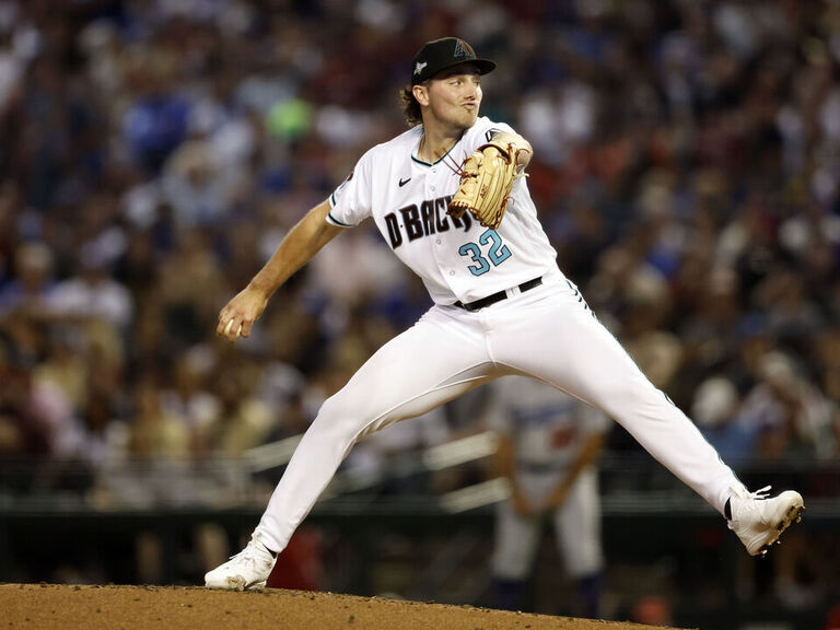 Photo: Derek Holland, who has been rocking a 'Wild Thing' haircut