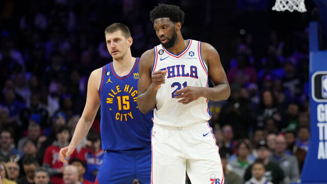 PHILADELPHIA, PA - JANUARY 28: Nikola Jokic #15 of the Denver Nuggets and Joel Embiid #21 of the Philadelphia 76ers look on during the game on January 28, 2023 at the Wells Fargo Center in Philadelphia, Pennsylvania NOTE TO USER: User expressly acknowledges and agrees that, by downloading and/or using this Photograph, user is consenting to the terms and conditions of the Getty Images License Agreement. Mandatory Copyright Notice: Copyright 2023 NBAE