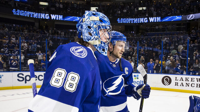 TAMPA, FL - NOVEMBER 25: Goalie Andrei Vasilevskiy #88 and Steven Stamkos #91 of the Tampa Bay Lightning celebrates the win against the St Louis Blues at Amalie Arena on November 25, 2022 in Tampa, Florida.