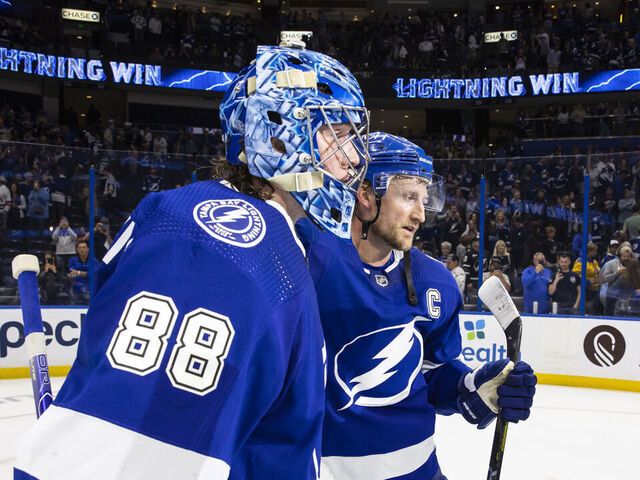 TAMPA, FL - NOVEMBER 25: Goalie Andrei Vasilevskiy #88 and Steven Stamkos #91 of the Tampa Bay Lightning celebrates the win against the St Louis Blues at Amalie Arena on November 25, 2022 in Tampa, Florida.