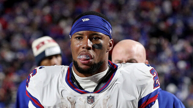 ORCHARD PARK, NEW YORK - OCTOBER 15: Saquon Barkley #26 of the New York Giants walks off the field during halftime against the Buffalo Bills at Highmark Stadium on October 15, 2023 in Orchard Park, New York.