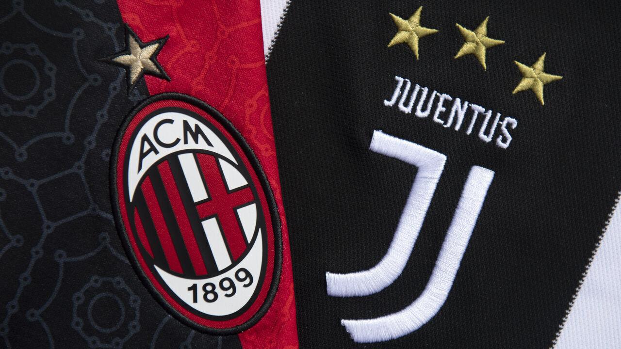MANCHESTER, ENGLAND - MAY 07: The AC Milan and Juventus badges on their first team home shirts on May 7, 2021 in Manchester, United Kingdom.
