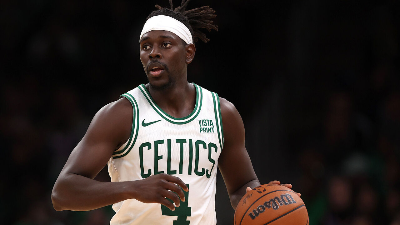BOSTON, MASSACHUSETTS - OCTOBER 17: Jrue Holiday #4 of the Boston Celtics dribbles during the second half of the Celtic's preseason game against the New York Knicks at TD Garden on October 17, 2023 in Boston, Massachusetts.