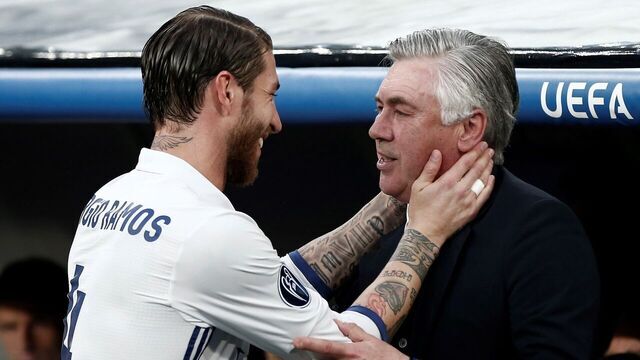 MADRID, SPAIN - APRIL 18 : Head coach of Real Madrid Sergio Ramos (L) hugs coach of Munich Carlo Ancelotti (R) during the UEFA Champions League quarter final match between FC Bayern Munich and Real Madrid, at the Santiago Bernabeu Stadium in Madrid, Spain on April 18, 2017.