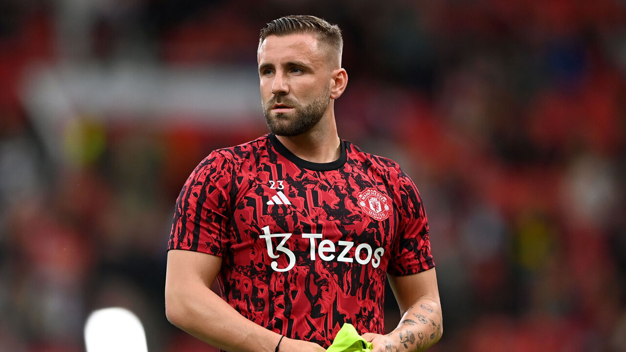 MANCHESTER, ENGLAND - AUGUST 14: Luke Shaw of Manchester United warms up ahead of the Premier League match between Manchester United and Wolverhampton Wanderers at Old Trafford on August 14, 2023 in Manchester, England.