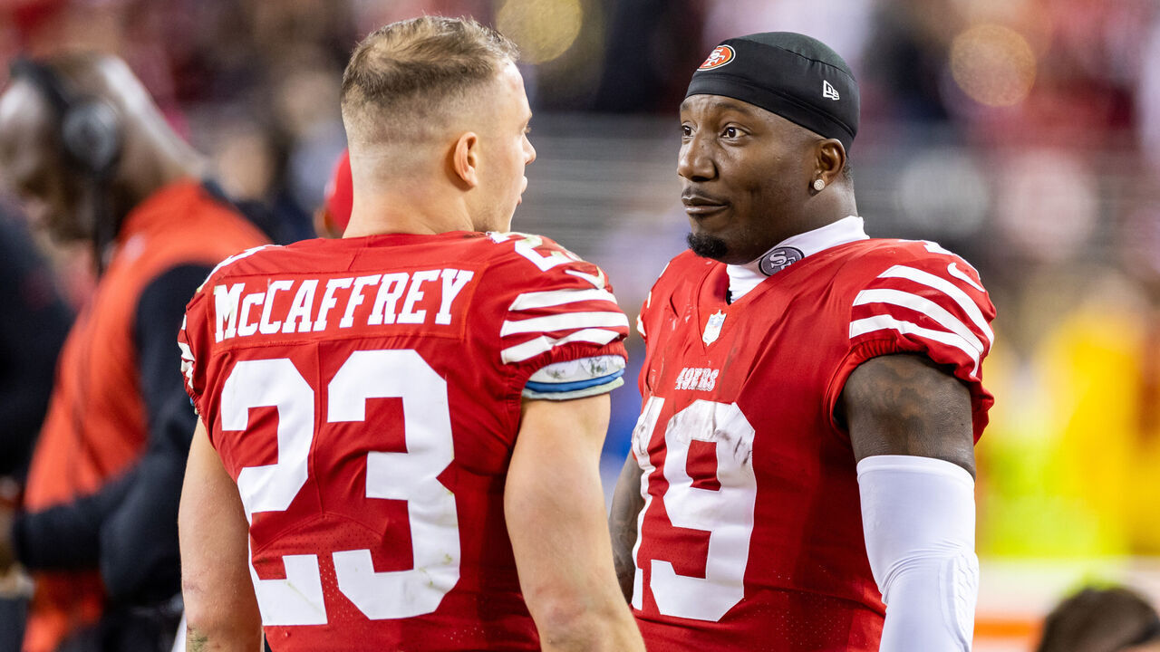 SANTA CLARA, CA - JANUARY 22: San Francisco 49ers wide receiver Deebo Samuel (19) talks to San Francisco 49ers running back Christian McCaffrey (23) on the sidelines during the NFL NFC Divisional Playoff game between the Dallas Cowboys and San Francisco 49ers at Levis Stadium in Santa Clara, CA.