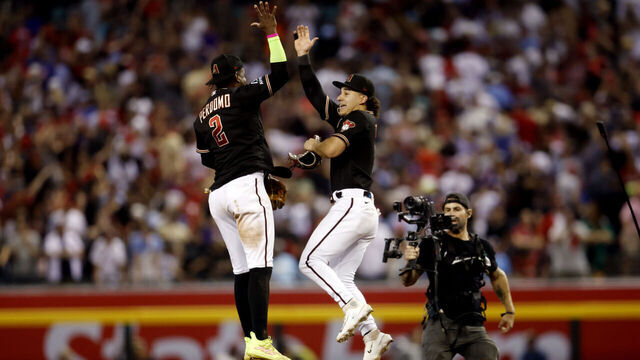PHOENIX, AZ - OCTOBER 20: Geraldo Perdomo #2 and Alek Thomas #5 of the Arizona Diamondbacks celebrate after the Diamondbacks defeated the Philadelphia Phillies in Game 4 of the NLCS at Chase Field on Friday, October 20, 2023 in Phoenix, Arizona.