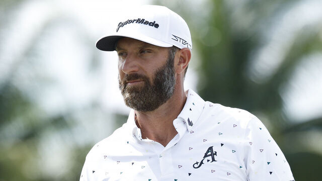 DORAL, FLORIDA - OCTOBER 19: Captain Dustin Johnson of 4Aces GC looks on from the practice green during the pro-am prior to the LIV Golf Invitational - Miami at Trump National Doral Miami on October 19, 2023 in Doral, Florida.