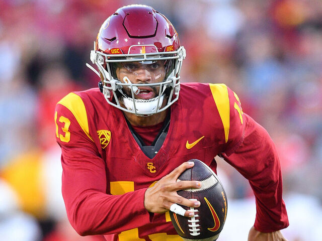 LOS ANGELES, CA - OCTOBER 21: USC Trojans quarterback Caleb Williams (13) runs the ball during a game between the Utah Utes and the USC Trojans on October 21, 2023, at Los Angeles Memorial Coliseum in Los Angeles, CA.