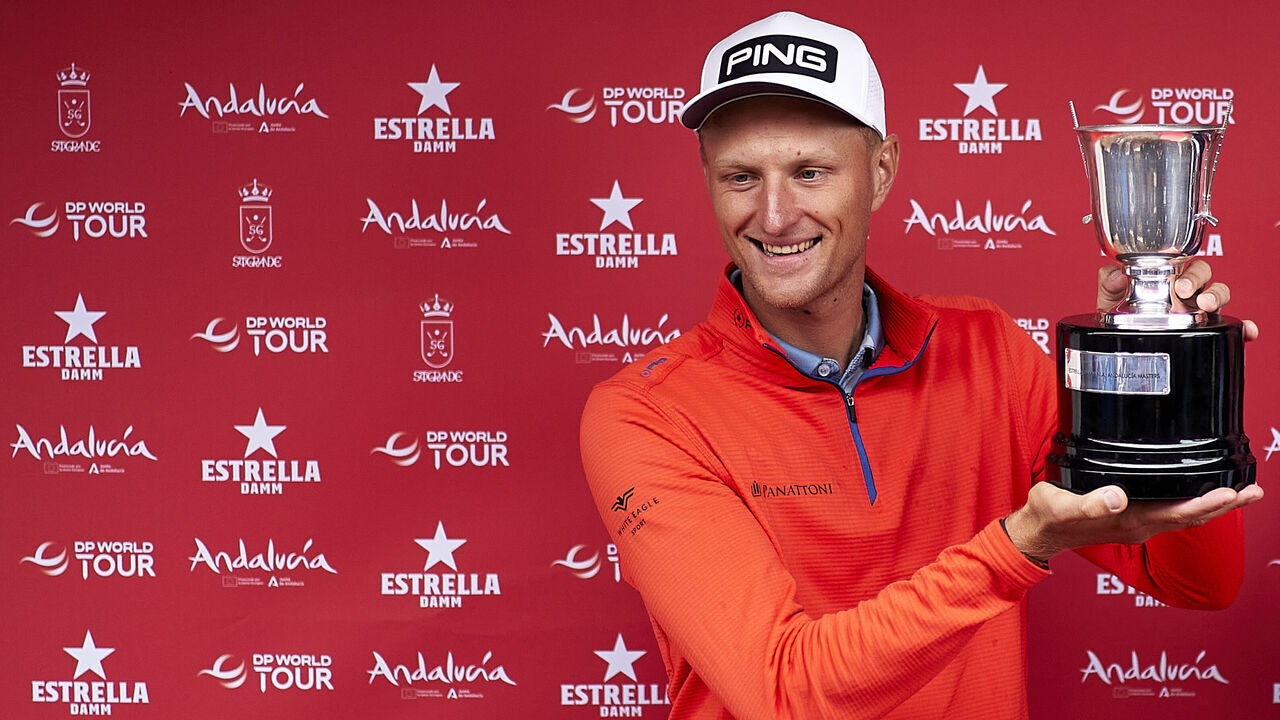 SAN ROQUE, SPAIN - OCTOBER 22: Adrian Meronk of Poland celebrates with the trophy after winning the Estrella Damm during Day Four of the Estrella Damm N.A. Andalucía Masters at Real Club de Golf Sotogrande on October 22, 2023 in San Roque, Spain.