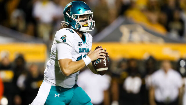 BOONE, NC - OCTOBER 10: Grayson McCall #10 of the Coastal Carolina Chanticleers looks to throw the ball during a football game against the Appalachian State Mountaineers at Kidd Brewer Stadium in Boone, North Carolina on Oct 10, 2023.