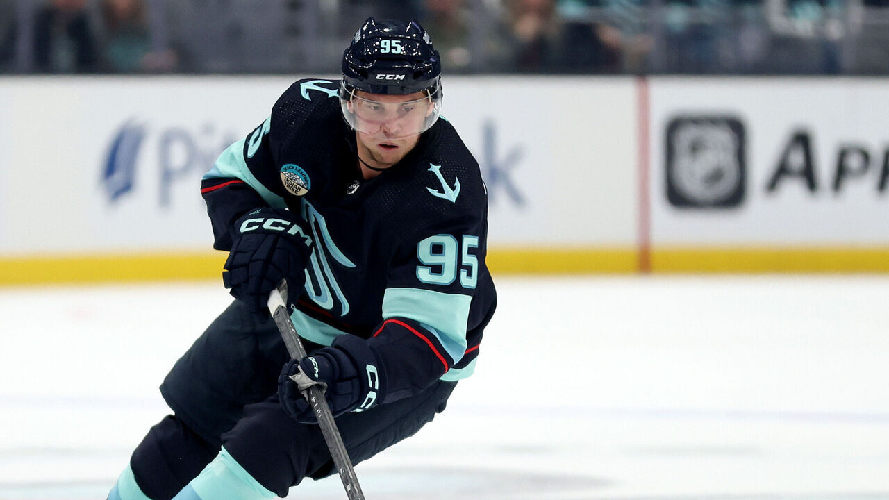 SEATTLE, WASHINGTON - OCTOBER 19: Andre Burakovsky #95 of the Seattle Kraken skates against the Carolina Hurricanes during the second period at Climate Pledge Arena on October 19, 2023 in Seattle, Washington.