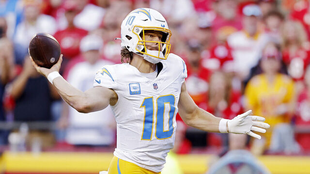 KANSAS CITY, MISSOURI - OCTOBER 22: Justin Herbert #10 of the Los Angeles Chargers throws a pass during the second half against the Kansas City Chiefs at GEHA Field at Arrowhead Stadium on October 22, 2023 in Kansas City, Missouri.