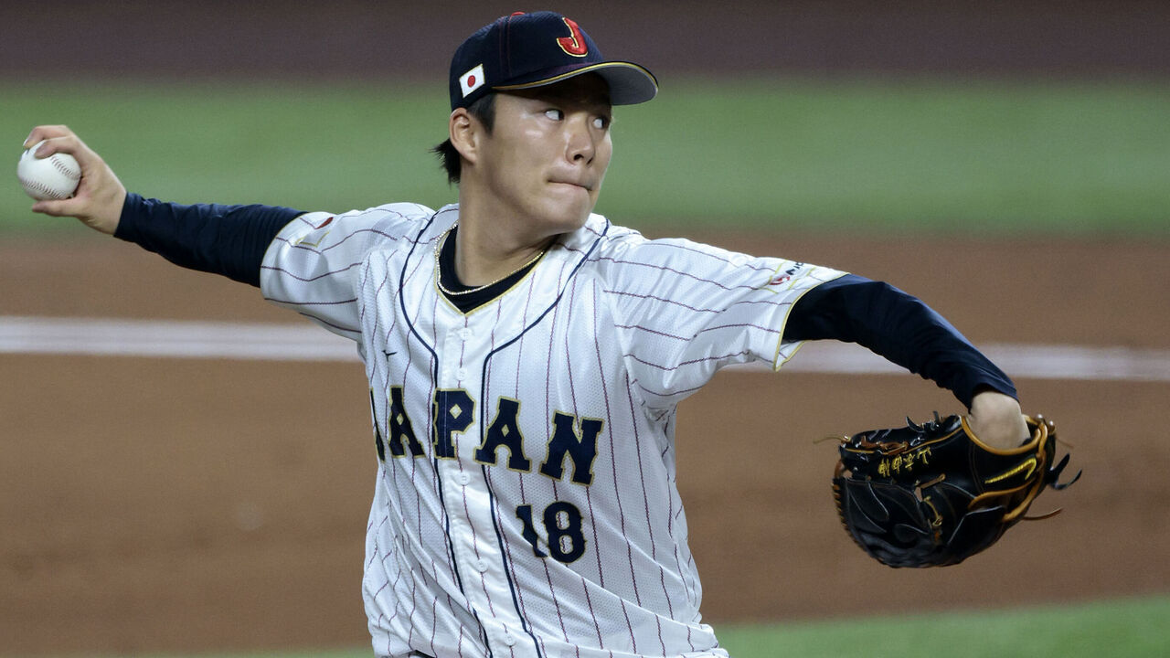 MIAMI, FL - MARCH 20: Yoshinobu Yamamoto #18 of Team Japan pitches during the 2023 World Baseball Classic Semifinal game against Team Mexico at loanDepot Park on Monday, March 20, 2023 in Miami, Florida.