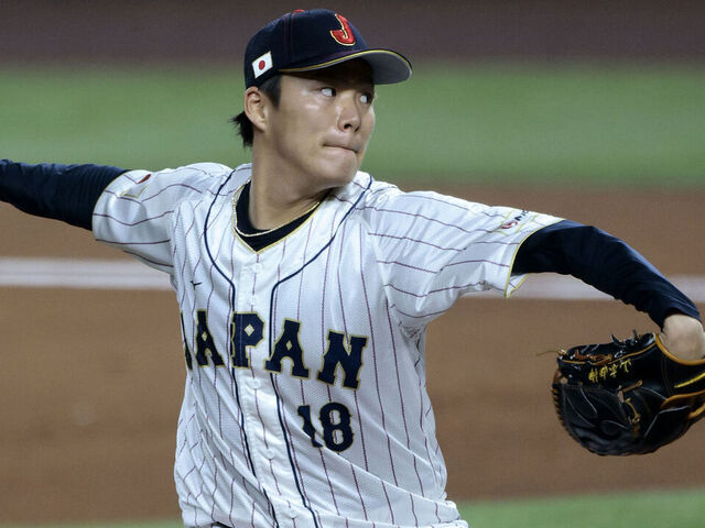 MIAMI, FL - MARCH 20: Yoshinobu Yamamoto #18 of Team Japan pitches during the 2023 World Baseball Classic Semifinal game against Team Mexico at loanDepot Park on Monday, March 20, 2023 in Miami, Florida.