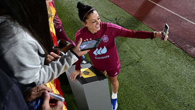 Spain's forward Jenni Hermoso poses for selfie with fans at the end of a training session at the Ciudad del Futbol training facilities in Las Rozas de Madrid on October 23, 2023, as part of the team's preparation for their upcoming UEFA Women's Nations League football matches against Italy and Switzerland.