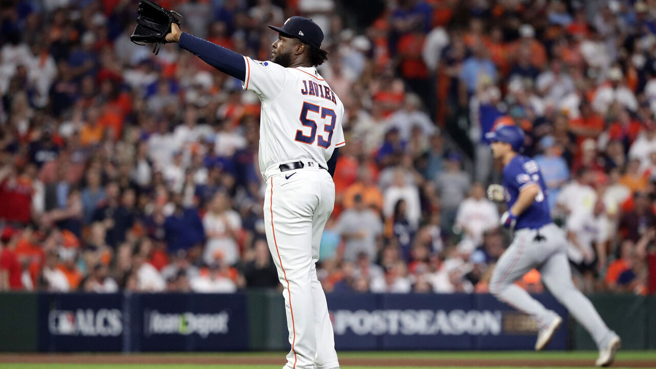 HOUSTON, TEXAS - OCTOBER 23: Cristian Javier #53 of the Houston Astros reacts after giving up a solo home run to Corey Seager #5 of the Texas Rangers during the first inning in Game Seven of the American League Championship Series at Minute Maid Park on October 23, 2023 in Houston, Texas.