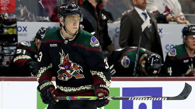 TEMPE, ARIZONA - OCTOBER 21: Travis Dermott #33 of the Arizona Coyotes skates on the ice with pride tape at Mullett Arena on October 21, 2023 in Tempe, Arizona.