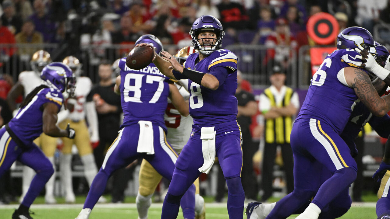 MINNEAPOLIS, MINNESOTA - OCTOBER 23: Kirk Cousins #8 of the Minnesota Vikings throws a first half pass against the San Francisco 49ers at U.S. Bank Stadium on October 23, 2023 in Minneapolis, Minnesota.