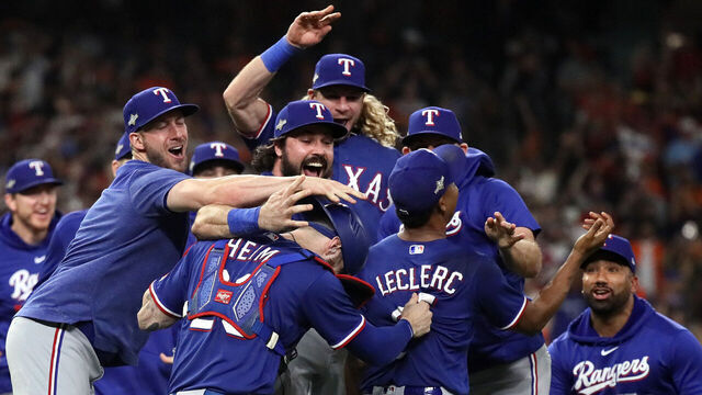 HOUSTON, TEXAS - OCTOBER 23: Jose Leclerc #25 of the Texas Rangers celebrates with Jonah Heim #28 after defeating the Houston Astros in Game Seven to win the American League Championship Series at Minute Maid Park on October 23, 2023 in Houston, Texas.