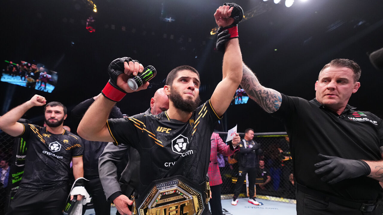 ABU DHABI, UNITED ARAB EMIRATES - OCTOBER 21: Islam Makhachev of Russia reacts after his knockout victory against Alexander Volkanovski of Australia in the UFC lightweight championship fight during the UFC 294 event at Etihad Arena on October 21, 2023 in Abu Dhabi, United Arab Emirates.
