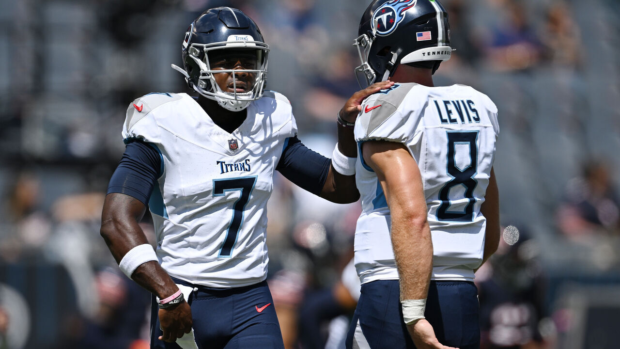CHICAGO, ILLINOIS - AUGUST 12: Malik Willis #7 and Will Levis #8 of the Tennessee Titans warm up before the preseason game against the Chicago Bears at Soldier Field on August 12, 2023 in Chicago, Illinois.
