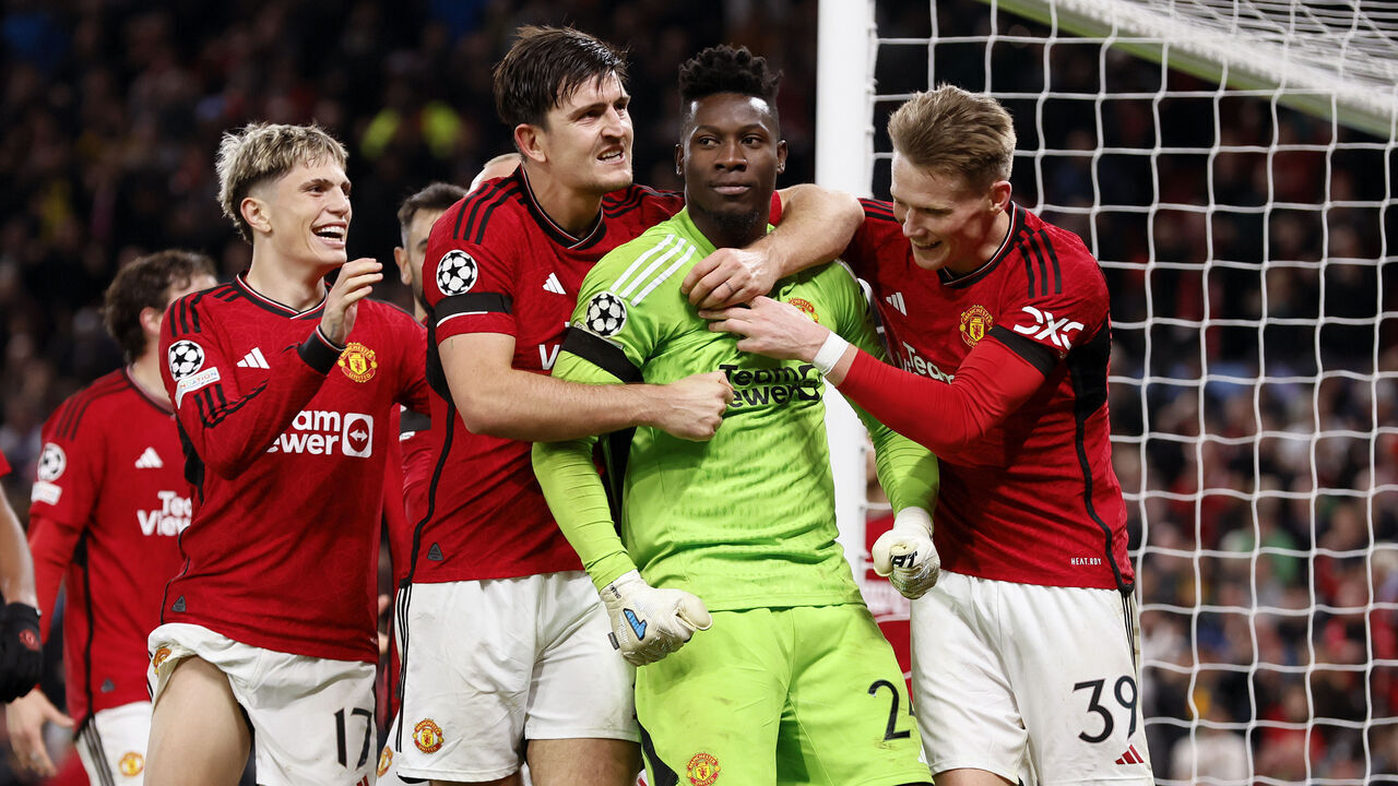 MANCHESTER, ENGLAND - OCTOBER 24: Harry Maguire and Scott McTominay of Manchester United and Andre Onana celebrates last minute save during the UEFA Champions League match between Manchester United and F.C. Copenhagen at Old Trafford on October 24, 2023 in Manchester, England.