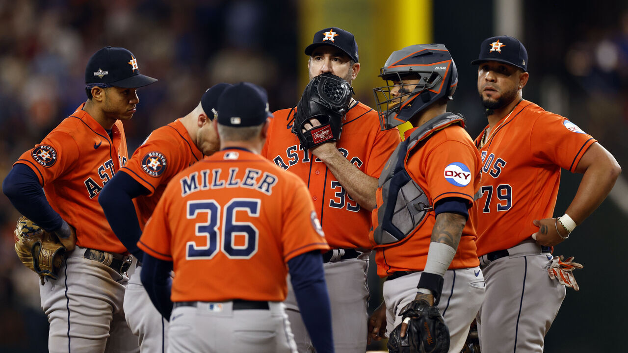 ARLINGTON, TX - OCTOBER 20: Justin Verlander #35, Martín Maldonado #15, pitching coach Joshua Miller #36, Jeremy Pena #3 and Jose Abreu #79 of the Houston Astros meet on the mound in the sixth inning during Game 5 of the ALCS between the Houston Astros and the Texas Rangers at Globe Life Field on Friday, October 20, 2023 in Arlington, Texas.