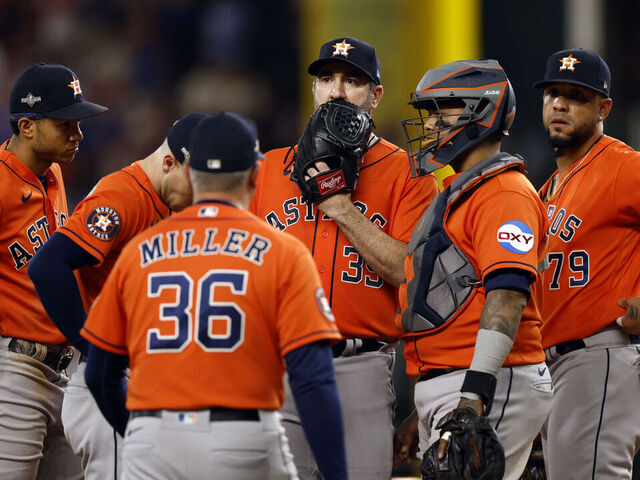 ARLINGTON, TX - OCTOBER 20: Justin Verlander #35, Martín Maldonado #15, pitching coach Joshua Miller #36, Jeremy Pena #3 and Jose Abreu #79 of the Houston Astros meet on the mound in the sixth inning during Game 5 of the ALCS between the Houston Astros and the Texas Rangers at Globe Life Field on Friday, October 20, 2023 in Arlington, Texas.