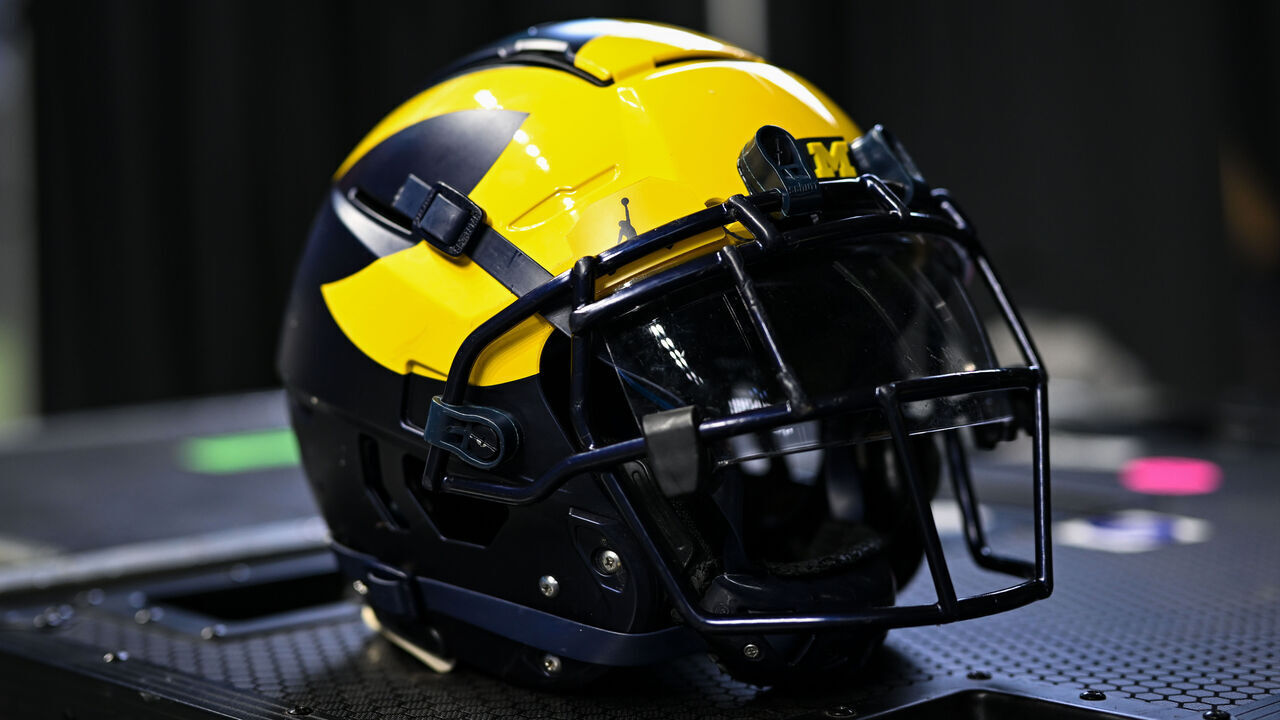 INDIANAPOLIS, IN - JULY 27: A Michigan Wolverines football helmet during the Big Ten Conference Media Days on July 27, 2023 at Lucas Oil Stadium in Indianapolis, IN