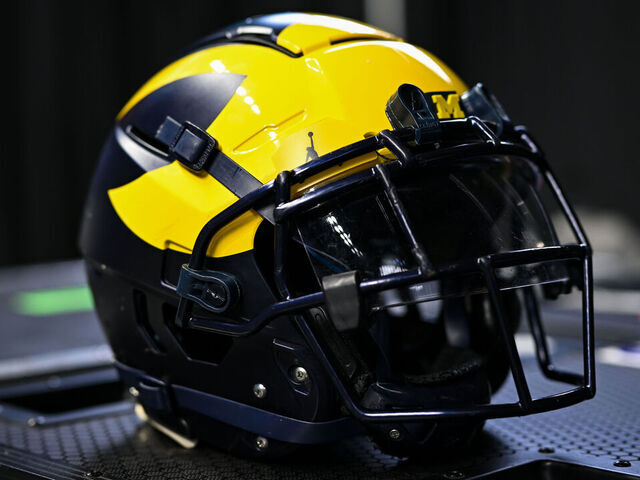 INDIANAPOLIS, IN - JULY 27: A Michigan Wolverines football helmet during the Big Ten Conference Media Days on July 27, 2023 at Lucas Oil Stadium in Indianapolis, IN