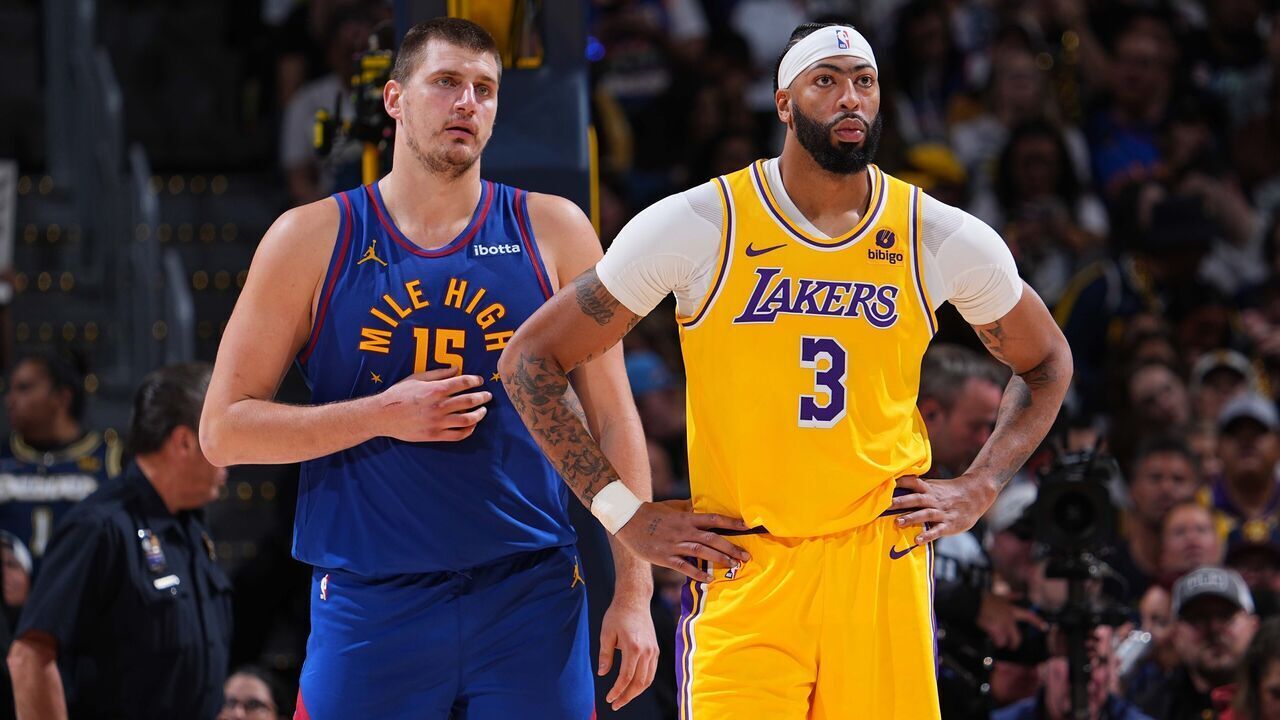DENVER, CO - OCTOBER 24: Nikola Jokic #15 of the Denver Nuggets and Anthony Davis #3 of the Los Angeles Lakers looks on during the game on October 24, 2023 at the Ball Arena in Denver, Colorado. NOTE TO USER: User expressly acknowledges and agrees that, by downloading and/or using this Photograph, user is consenting to the terms and conditions of the Getty Images License Agreement. Mandatory Copyright Notice: Copyright 2023 NBAE