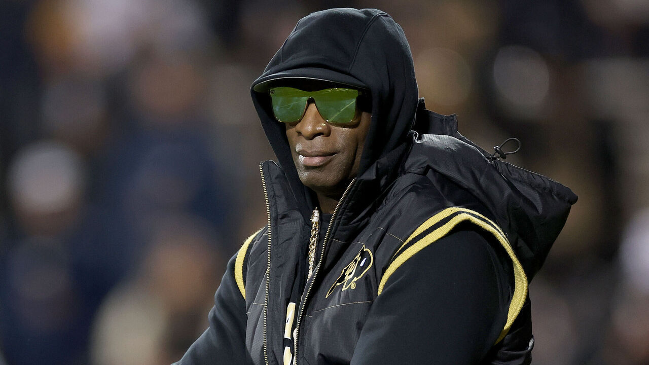 BOULDER, COLORADO - OCTOBER 13: Head coach Deion Sanders of the Colorado Buffaloes walks on the field during pregame against the Stanford Cardinal at Folsom Field on October 13, 2023 in Boulder, Colorado.