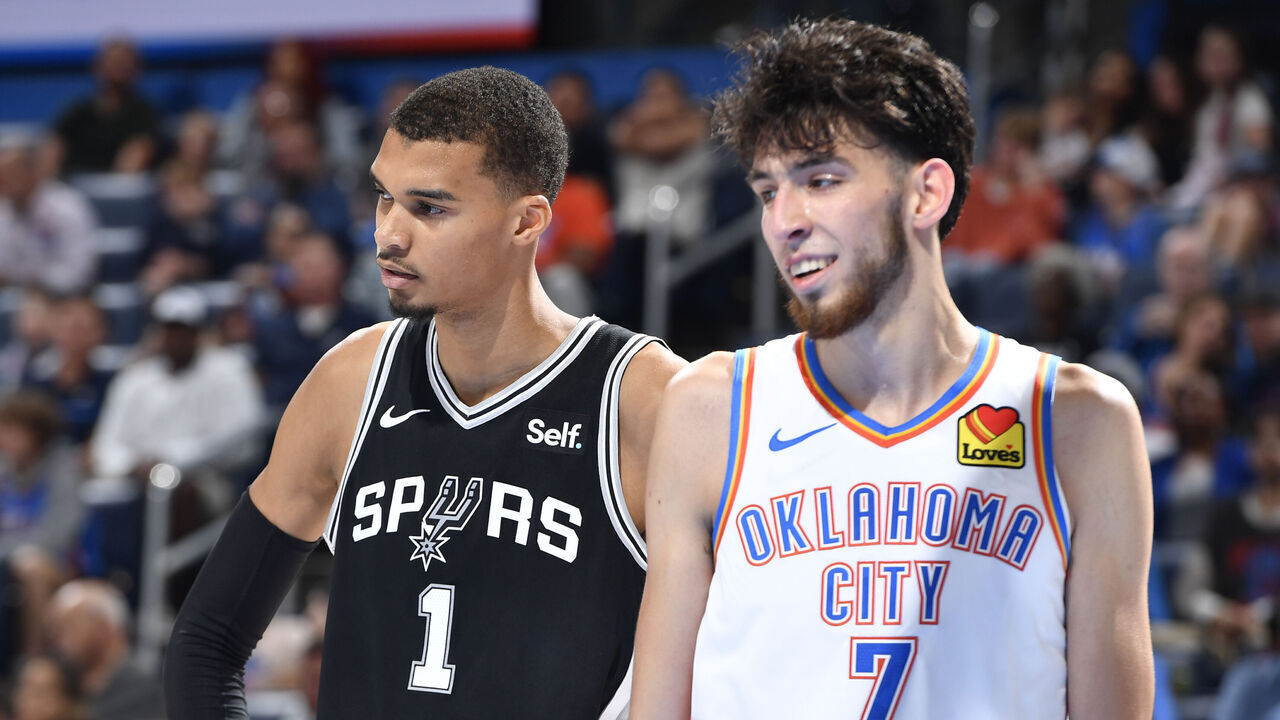 OKLAHOMA CITY, OK - OCTOBER 9: Victor Wembanyama #1 of the San Antonio Spurs and Chet Holmgren #7 of the Oklahoma City Thunder look on during the game on October 9, 2023 at the Paycom Center in Oklahoma City, OK. Mandatory Copyright Notice: Copyright 2023 NBAE