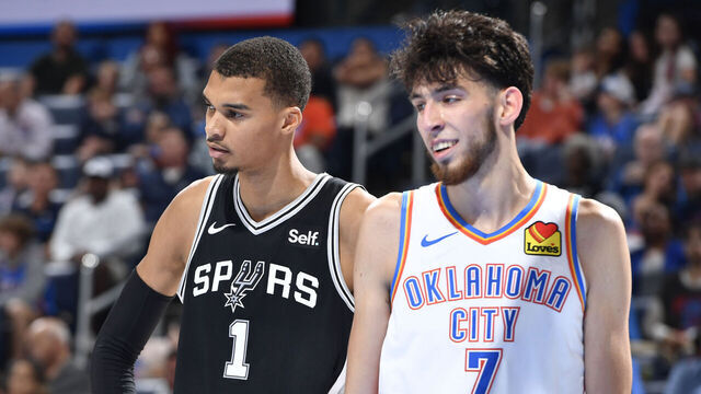 OKLAHOMA CITY, OK - OCTOBER 9: Victor Wembanyama #1 of the San Antonio Spurs and Chet Holmgren #7 of the Oklahoma City Thunder look on during the game on October 9, 2023 at the Paycom Center in Oklahoma City, OK. Mandatory Copyright Notice: Copyright 2023 NBAE