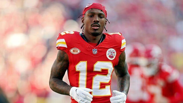 KANSAS CITY, MISSOURI - OCTOBER 22: Mecole Hardman Jr. #12 of the Kansas City Chiefs runs onto the field before the game against the Los Angeles Chargers at GEHA Field at Arrowhead Stadium on October 22, 2023 in Kansas City, Missouri.