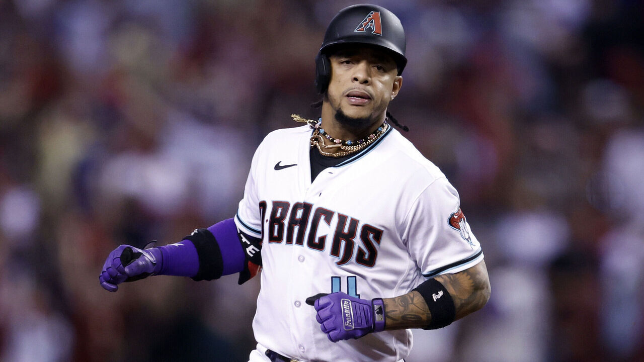 PHOENIX, AZ - OCTOBER 11: Ketel Marte #4 of the Arizona Diamondbacks reacts after hitting a home run during Game 3 of the Division Series between the Los Angeles Dodgers and the Arizona Diamondbacks at Chase Field on Wednesday, October 11, 2023 in Phoenix, Arizona.