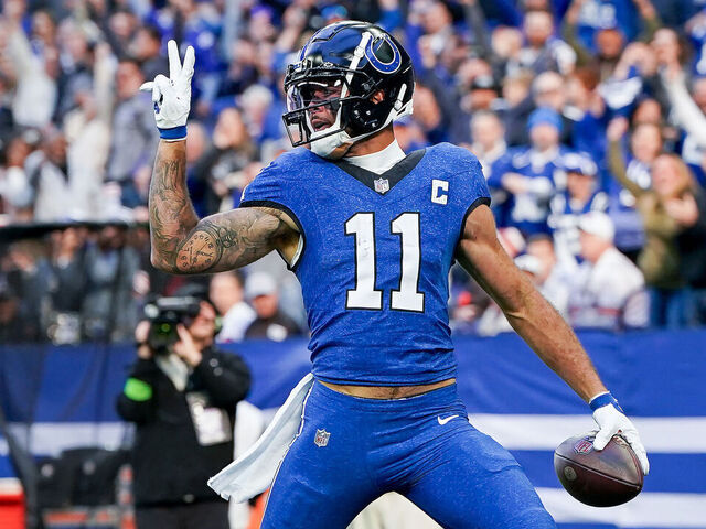 INDIANAPOLIS, INDIANA - OCTOBER 22: Michael Pittman Jr. #11 of the Indianapolis Colts gestures as he scores a touchdown in the fourth quarter against the Cleveland Browns at Lucas Oil Stadium on October 22, 2023 in Indianapolis, Indiana.