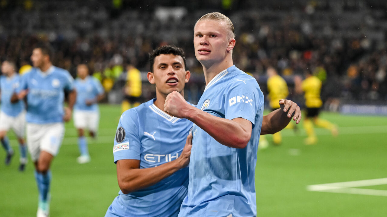 BERN, SWITZERLAND - OCTOBER 25: Erling Haaland of Manchester City celebrates after scoring his team's second goal with teammates during the UEFA Champions League match between BSC Young Boys and Manchester City at Stadion Wankdorf on October 25, 2023 in Bern, Switzerland.