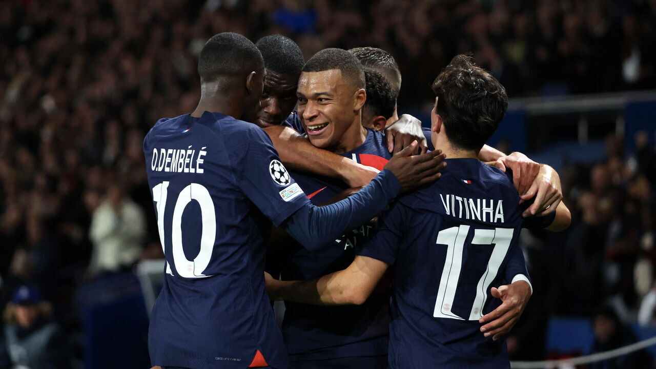 PARIS, FRANCE - OCTOBER 25: Kylian Mbappe #7 of Paris Saint-Germain celebrates his first goal with teammattes during the UEFA Champions League match between Paris Saint-Germain and AC Milan at Parc des Princes on October 25, 2023 in Paris, France.