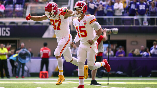 MINNEAPOLIS, MINNESOTA - OCTOBER 8: Patrick Mahomes #15 and Travis Kelce #87 of the Kansas City Chiefs take the field before the game against the Minnesota Vikings at U.S. Bank Stadium on October 8, 2023 in Minneapolis, Minnesota.