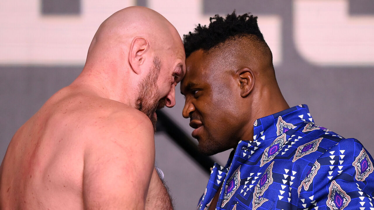 RIYADH, SAUDI ARABIA - OCTOBER 26: Tyson Fury and Francis Ngannou face off during a press conference ahead of the Tyson Fury v Francis Ngannou boxing match at Boulevard Hall on October 26, 2023 in Riyadh, Saudi Arabia.