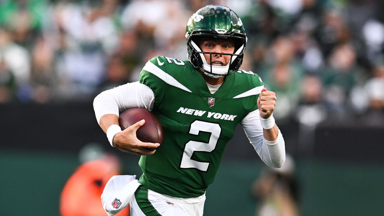 EAST RUTHERFORD, NJ - OCTOBER 15: Zach Wilson #2 of the New York Jets runs with the football during the first half against the Philadelphia Eagles at MetLife Stadium on October 15, 2023 in East Rutherford, New Jersey.
